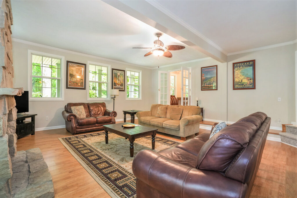 Cozy living room with leather sofas and decor