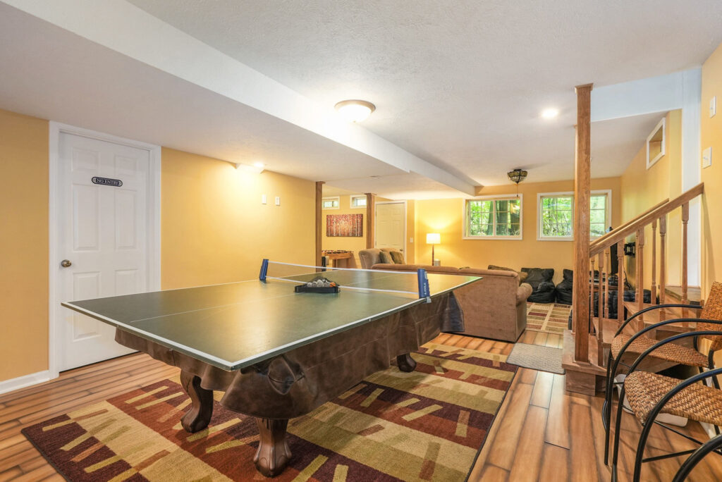 Basement game room with ping pong table