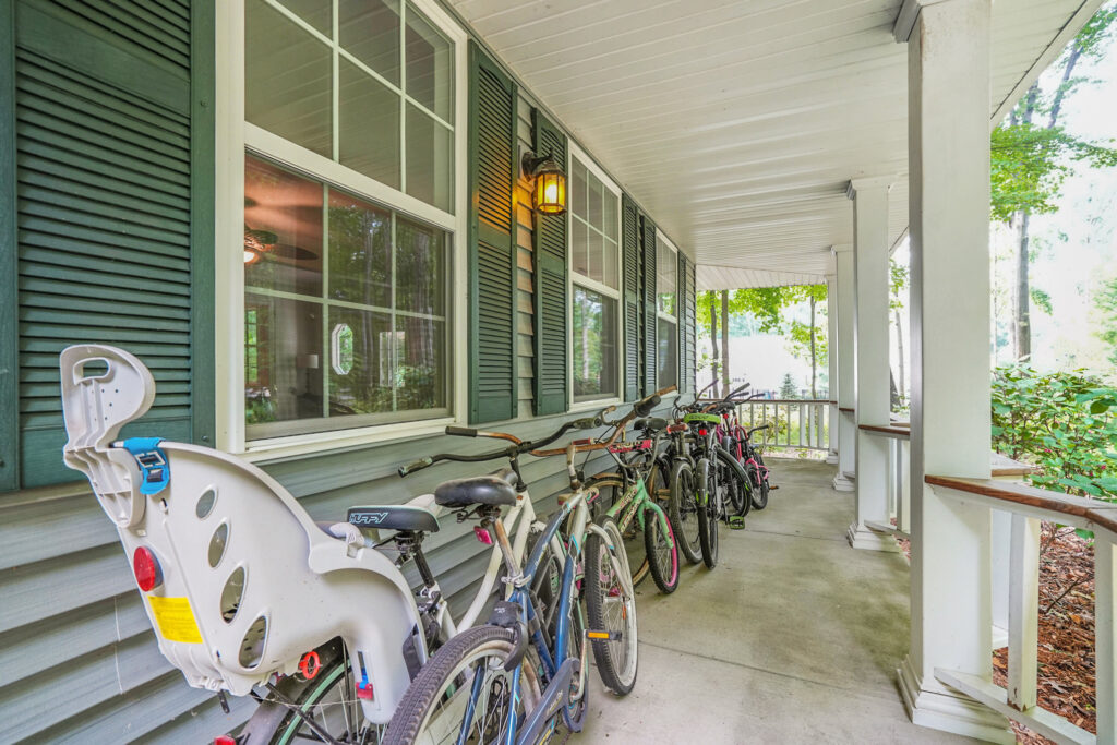 Bicycles parked on a shaded front porch