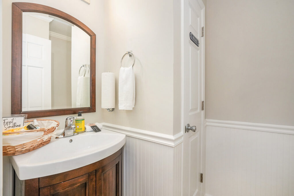 Small bathroom with sink and mirror