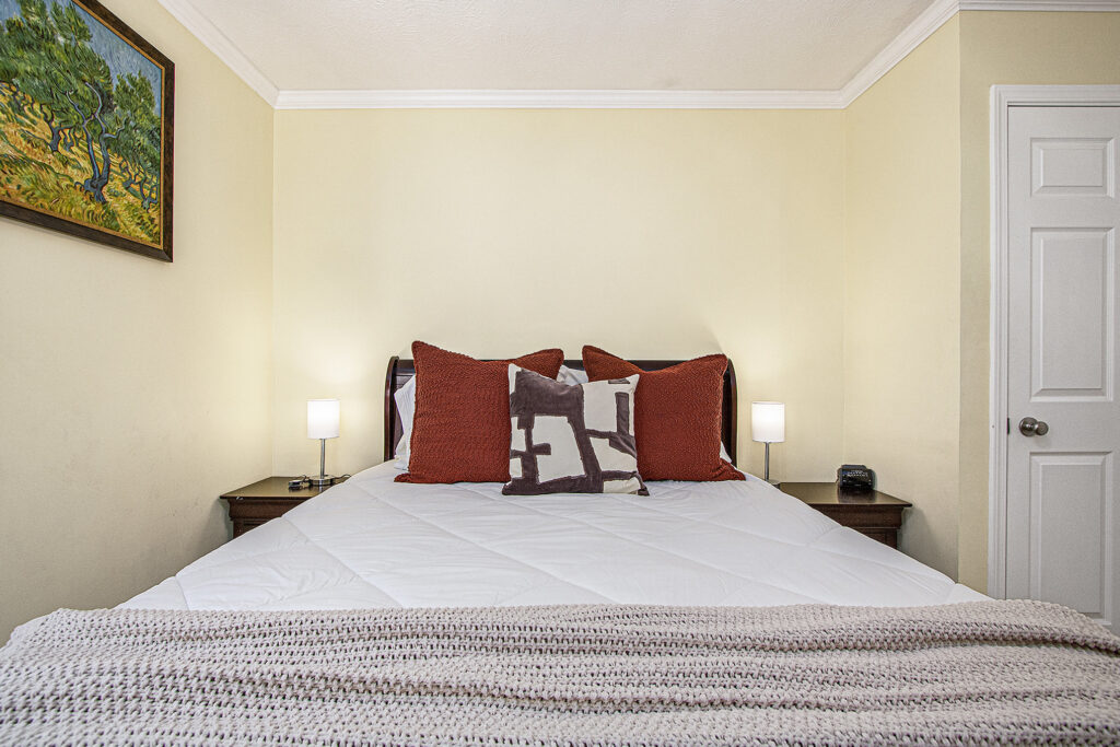 Cozy bedroom with bed and warm lighting