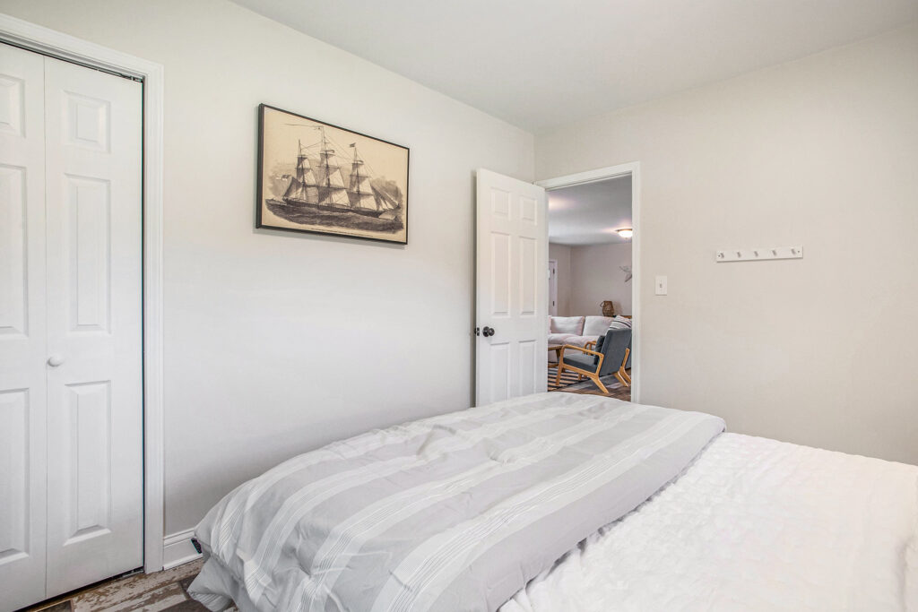 Cozy bedroom with view into living area