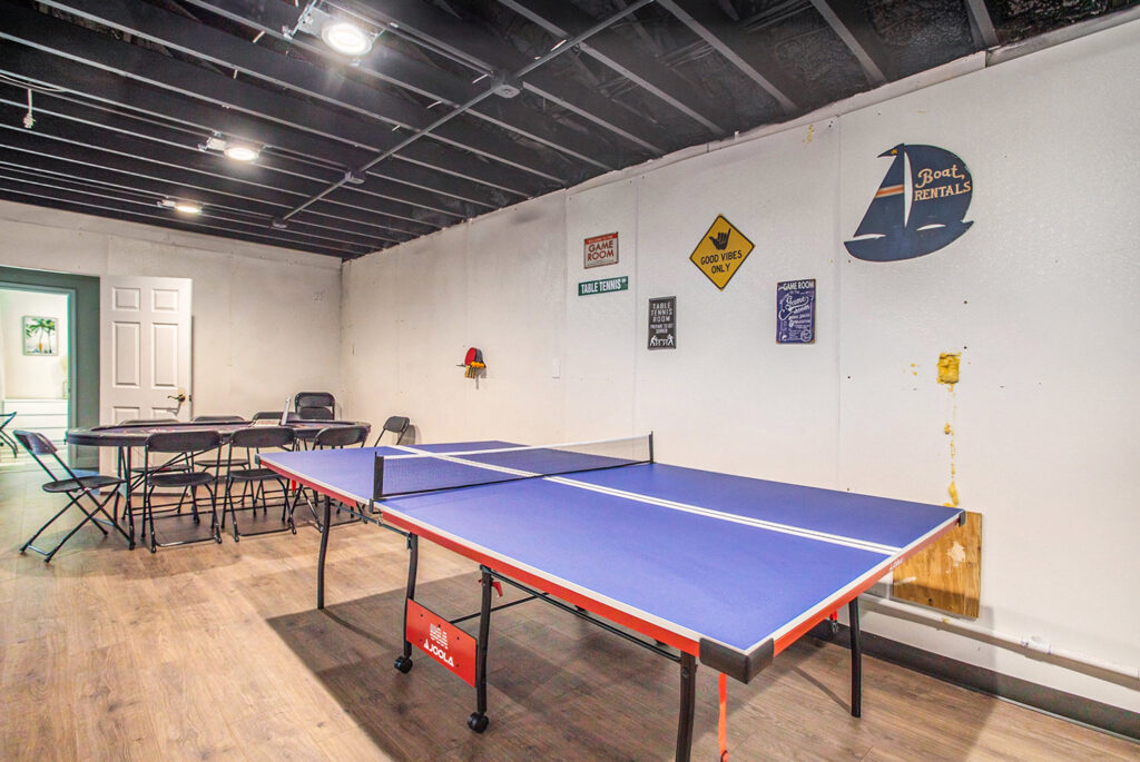 Basement game room with ping pong table