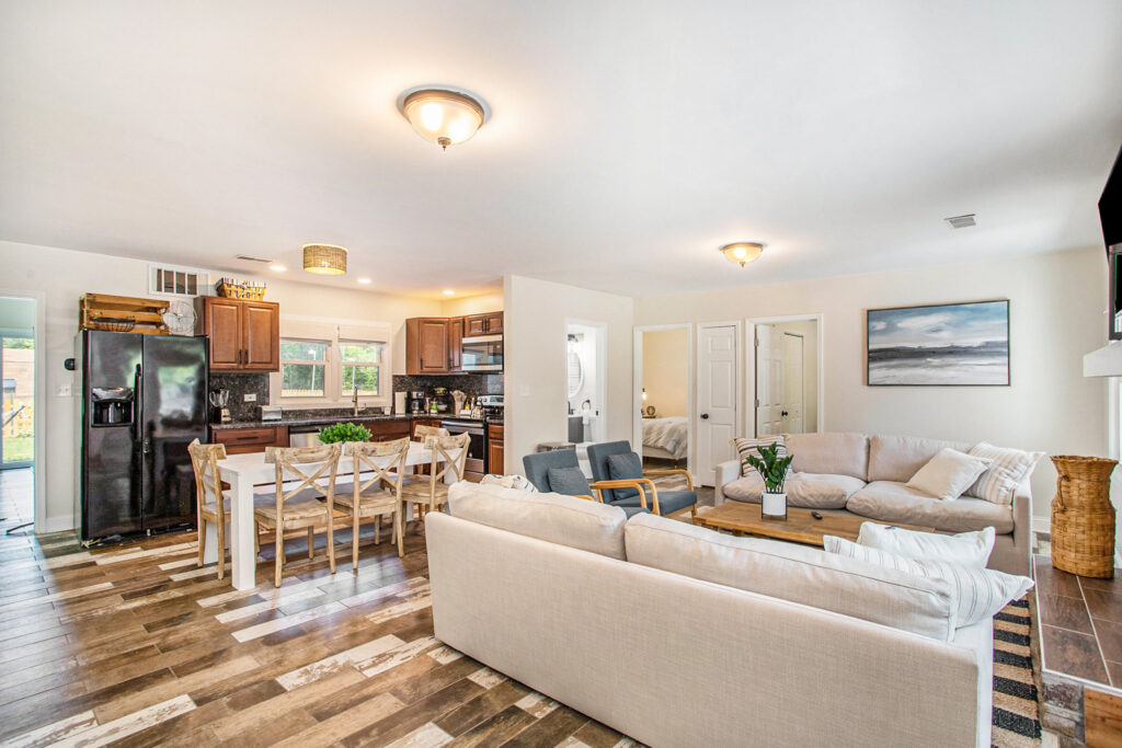 Modern open kitchen and cozy living room interior