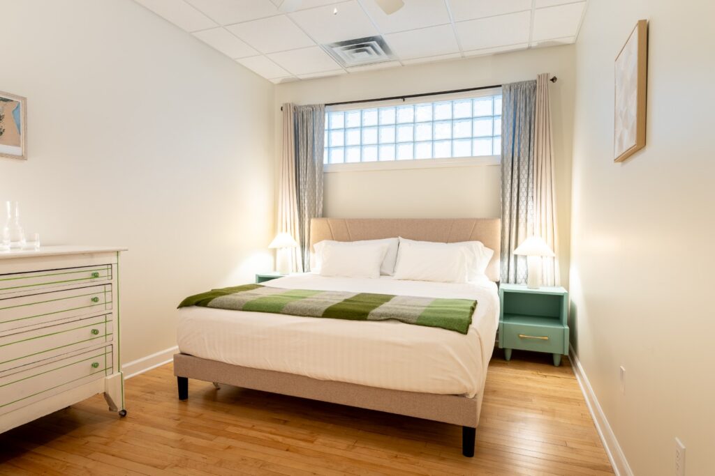 Cozy bedroom with bed and soft lighting