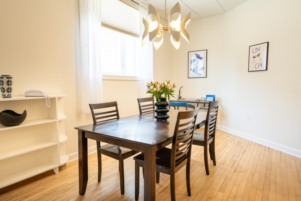 Bright dining room with wooden table and chairs