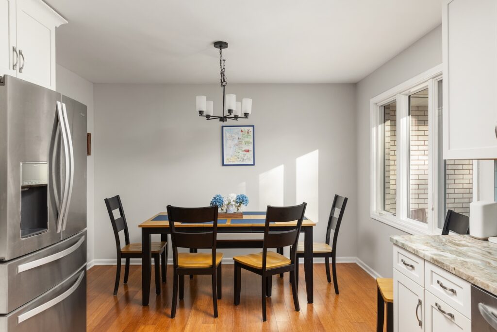 Modern dining area with wooden table and chairs