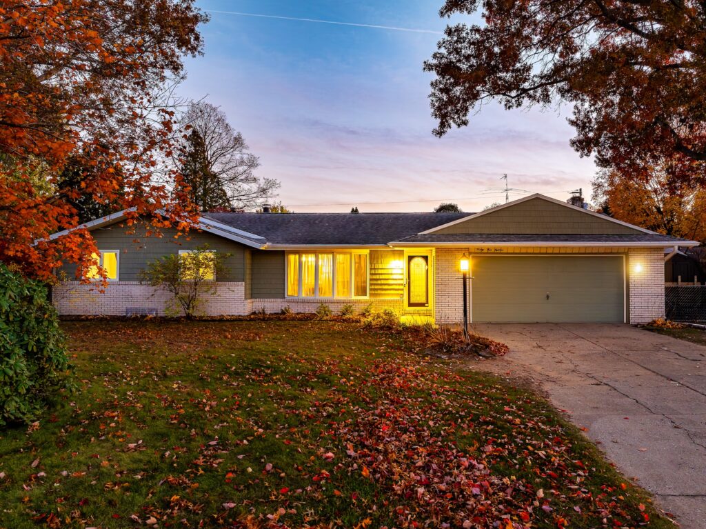 Suburban house exterior at sunset in autumn