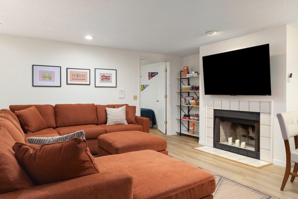 Cozy living room with sectional and fireplace