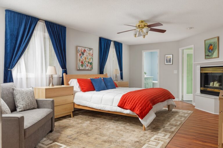 Modern bedroom with red and blue decor