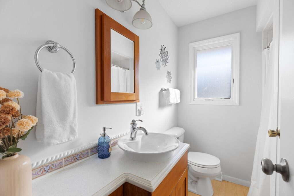 Bright modern bathroom with sink and mirror